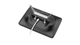 A picture of the back of a touch controller, the HP Poly TC10. It is lying flat and an Ethernet cable is close to the Ethernet port, showing where it would connect. The stand is also detached, showing that it can be removed and refitted.