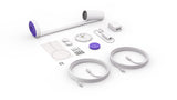 An image of the Logitech Scribe package contents laid out flat on a white background. The package includes a Logitech Scribe camera, a purple share button, a dongle transceiver, a power supply, two Cat5e cables, two cable clips, a camera mounting bracket, a mounting template, four boundary stickers and eight screws.