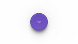 An image of the Logitech Scribe Share Button in purple.